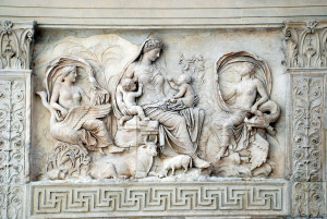 The center female figure meant to be Mother-nature at or even "Peace" surrounded by her benefits, the children and the fruits of the earth. 
